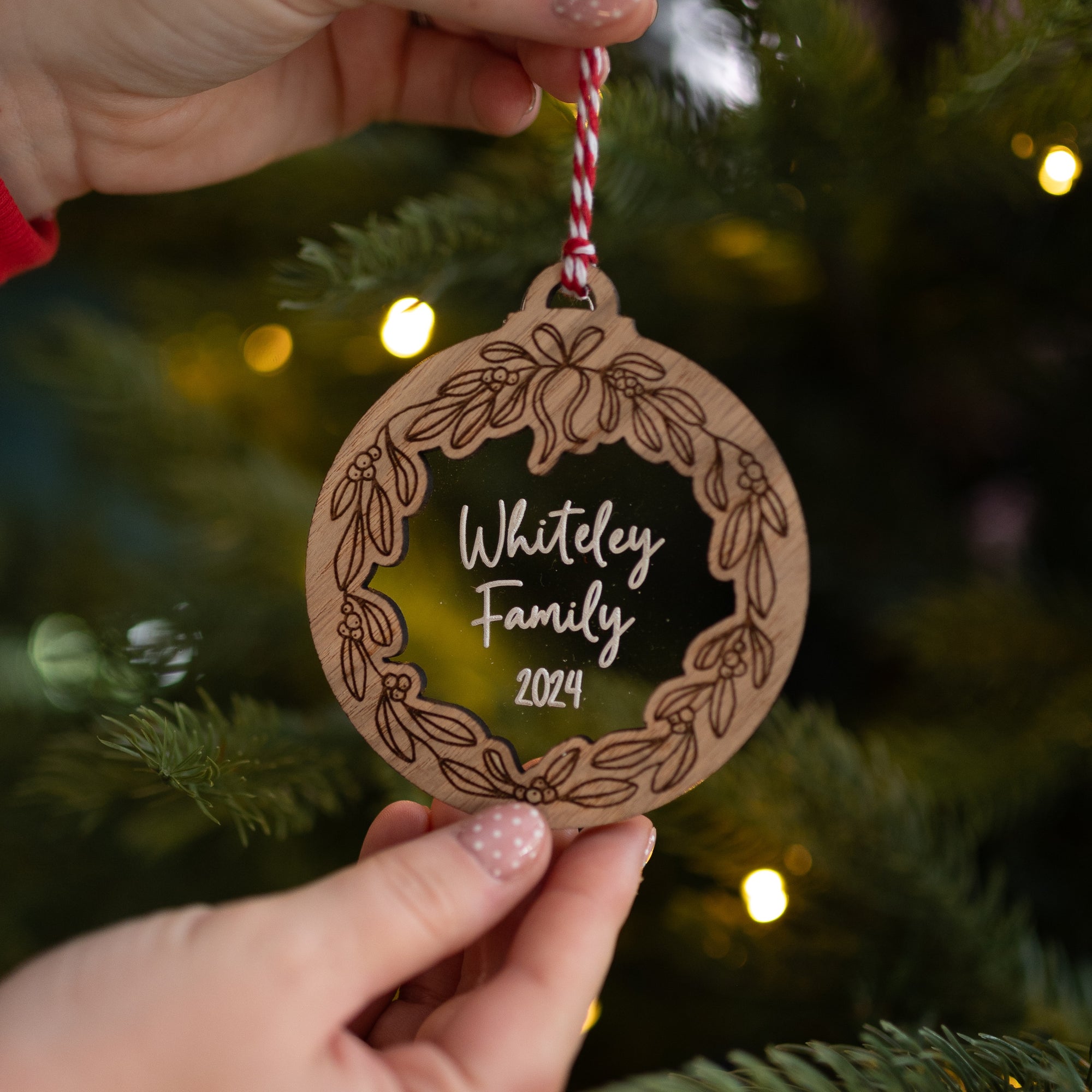 Personalised Christmas Ornament Made from Wood with an engraving